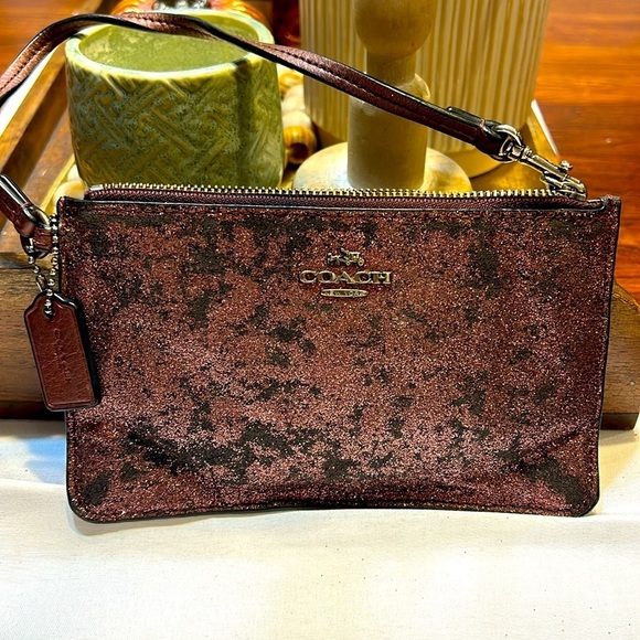 Coach Handbags - Coach Dark Raspberry Pink glitter wristlet
